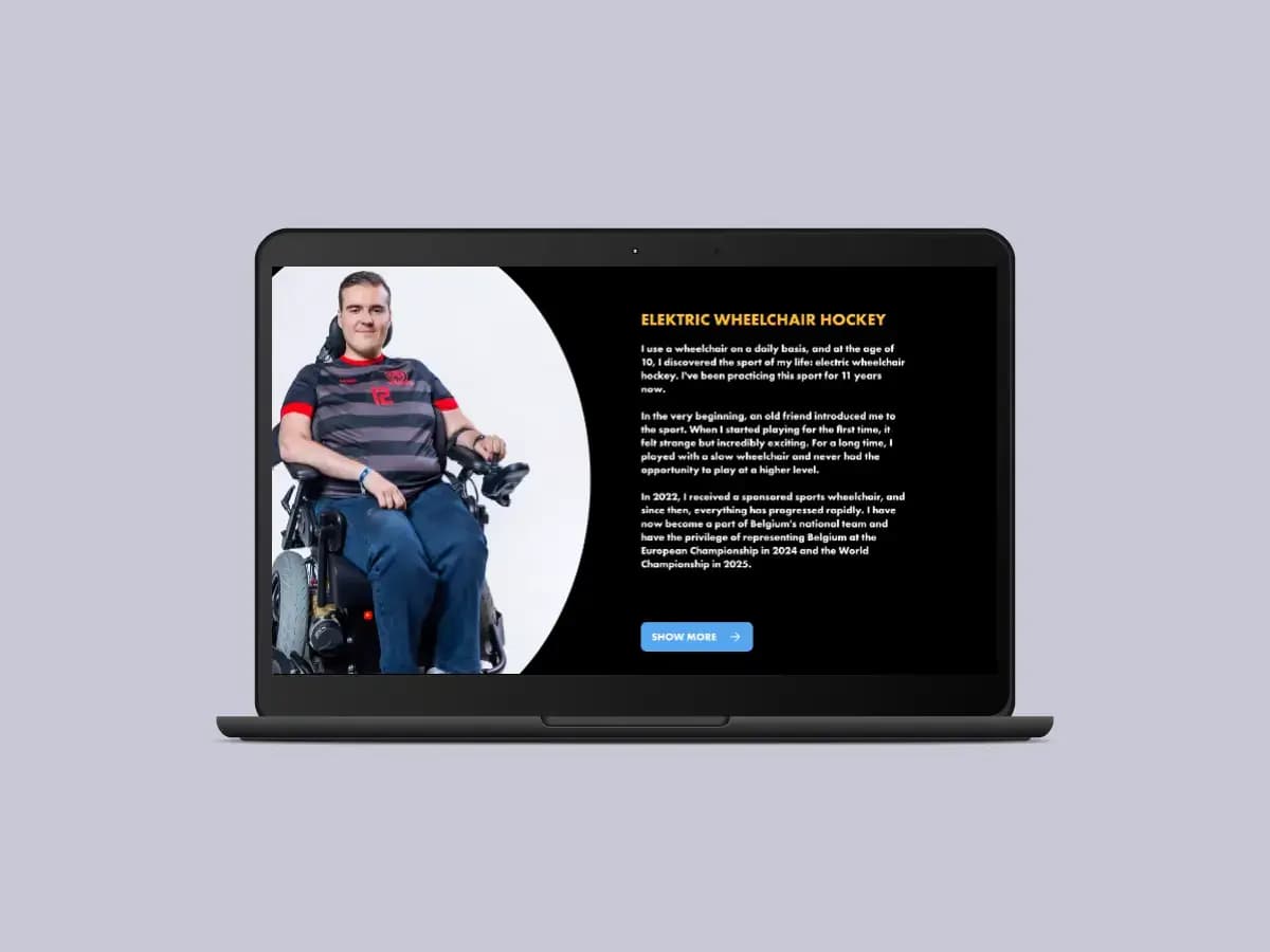 Black laptop displays a website about electric wheelchairs, showing a man using one.